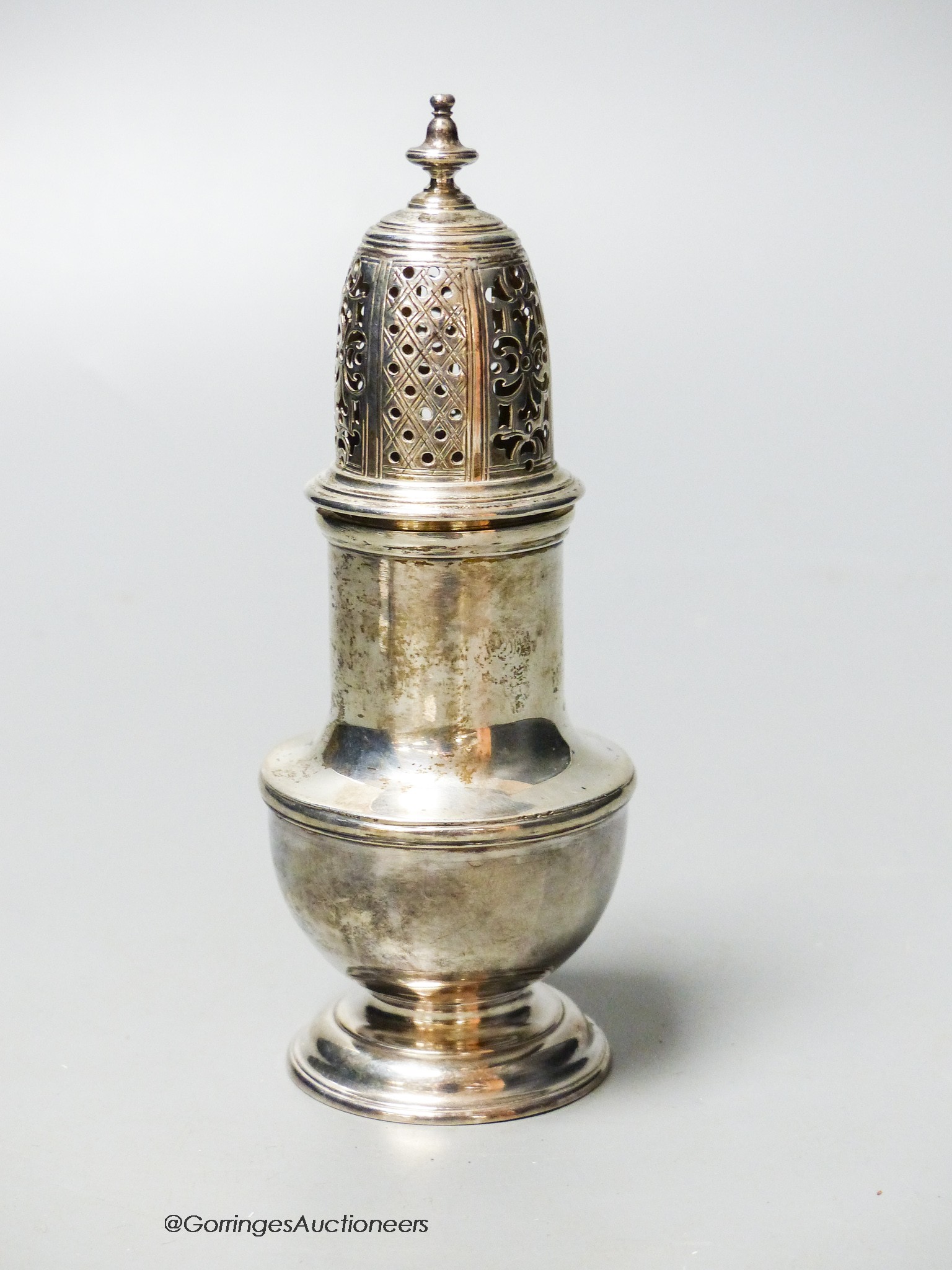 A George II silver baluster caster, Samuel Wood, London, 1730, 13.4cm, 3.5oz.